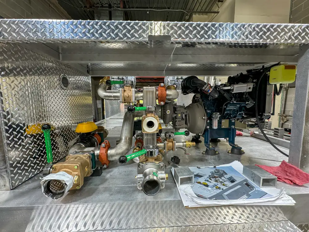 Apparatus in production bay with hood open, photo 171 of 303.